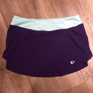 Pearl Izumi athletic purple fly pleated skirt